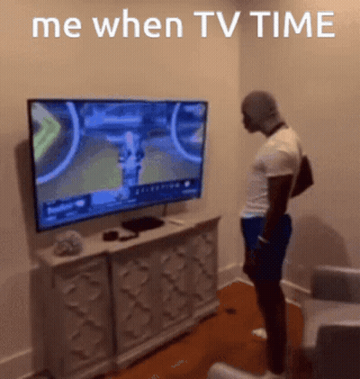 Man Standing In Front Of TV Saying Me When TV Time GIF