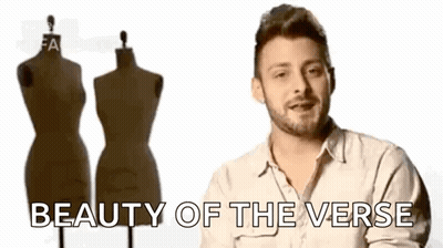 Man Standing In Front Of Two Mannequins With Beauty Of The Verse GIF