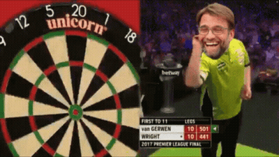 Man Standing In Front Of Unicorn Dart Board GIF