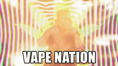 Man Standing In Front Of Vape Nation Background GIF