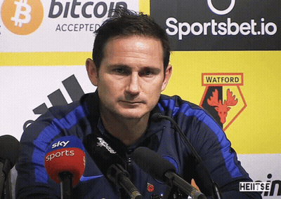Man Standing In Front Of Watford Sign GIF