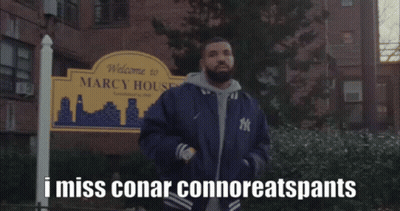 Man Standing In Front Of Welcome To Marcy House Sign GIF