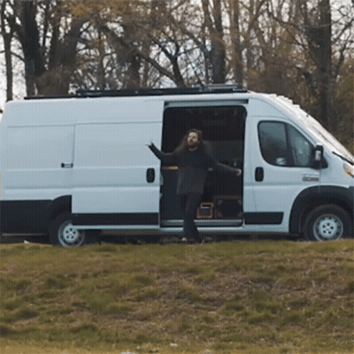 Man Standing In Front Of White Van With Door Open GIF