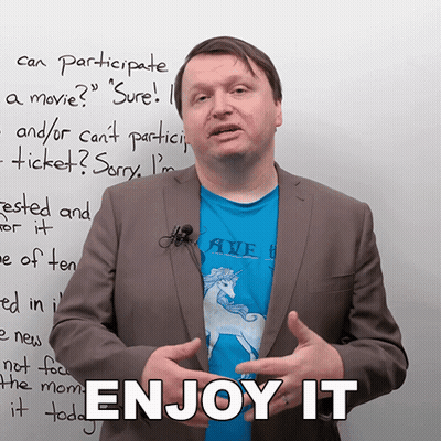 Man Standing In Front Of Whiteboard Saying Enjoy It GIF