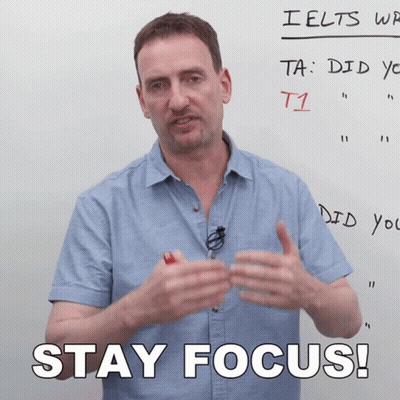 Man Standing In Front Of Whiteboard Saying Stay Focus GIF