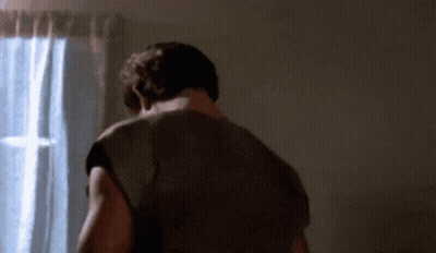 Man Standing In Front Of Window GIF