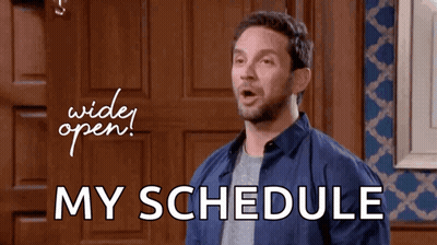 Man Standing In Front Of Wooden Door Saying My Schedule GIF