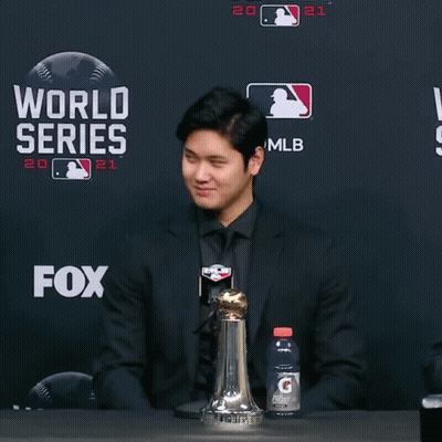 Man Standing In Front Of World Series 2021 GIF