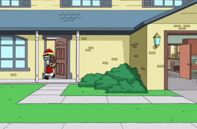 Man Standing In Front Of Yellow House GIF