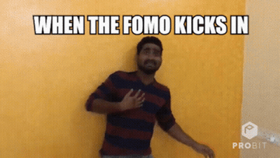 Man Standing In Front Of Yellow Wall When Fomo Kicks In GIF