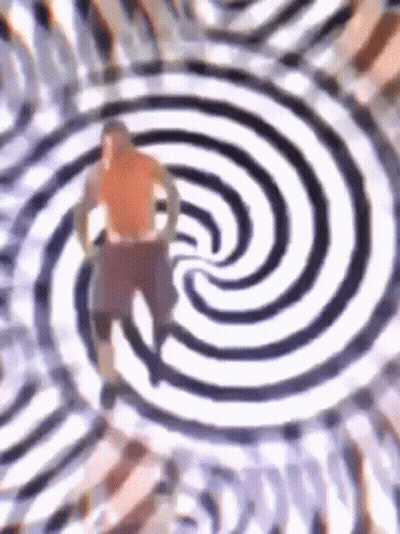 Man Standing In Hypnotic Swirl GIF
