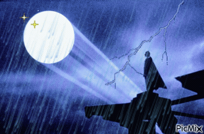Man Standing In Rain With Picmix Logo GIF