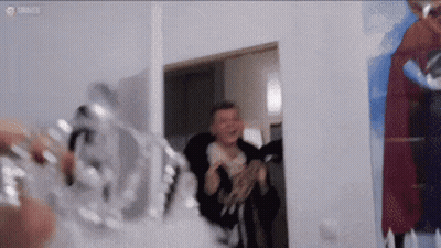 Man Standing In Room With Painting GIF