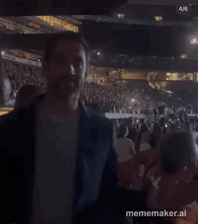 Man Standing In Stadium Crowd GIF