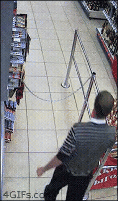 Man Standing In Store GIF
