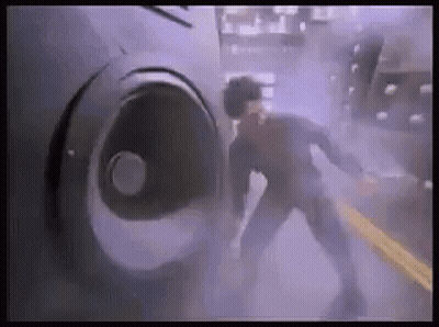 Man Standing In Tunnel GIF