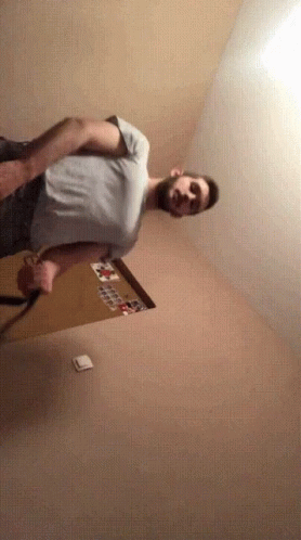 Man Standing Near Light Switch GIF