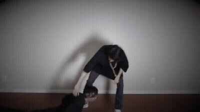 Man Standing Next To Another Man GIF