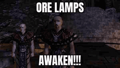 Man Standing Next to Another Man Says Ore Lamps Awaken