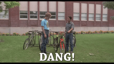 Man Standing Next To Bicycle With Dang GIF