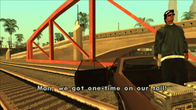 Man Standing Next To Car Saying Man We Got One-Time On Our Tail GIF
