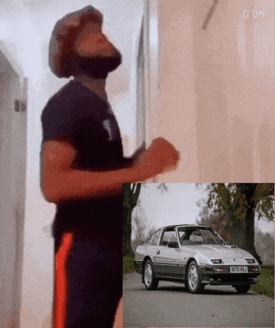 Man Standing Next To Car With License Plate B570WJ GIF