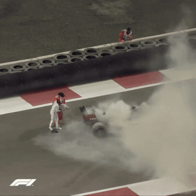 Man Standing Next To Car With Smoke GIF