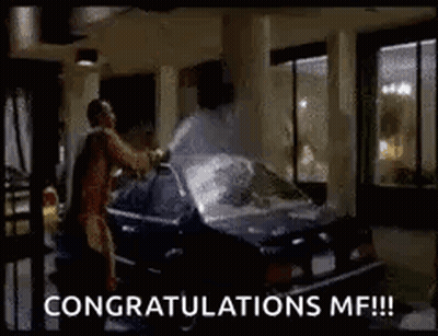 Man Standing Next To Car With Trunk Open Saying Congratulations MF GIF