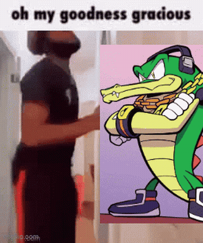 Man Standing Next To Crocodile And Cartoon Character GIF