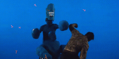 Man Standing Next To Giant Robot GIF