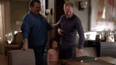 Man Standing Next To Little Girl In Living Room GIF