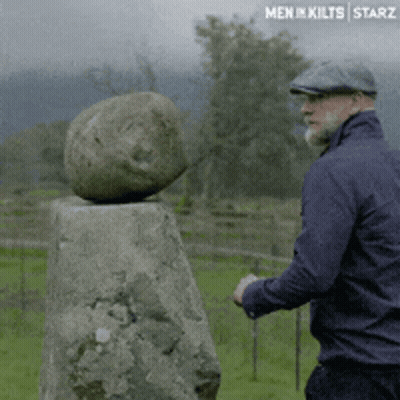 Man Standing Next To Men In Kilts Starz Rock GIF