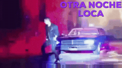 Man Standing Next To Police Car Otra Noche Loca GIF