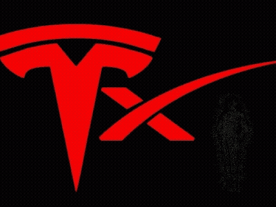 Man Standing Next To Red Tesla Logo GIF