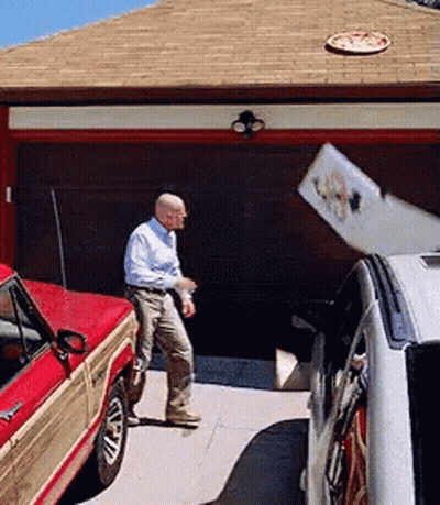 Man Standing Next To Red Truck GIF