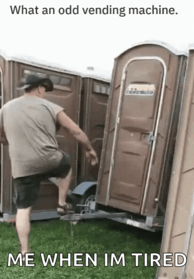 Man Standing Next To Trailer With Portable Toilet GIF