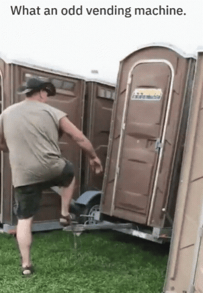 Man Standing Next To Trailer With Portable Toilet GIF