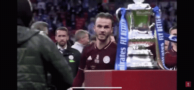 Man Standing Next To Trophy Saying Emirates Fly Better GIF