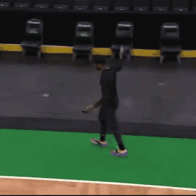 Man Standing On Basketball Court Holding Ball GIF