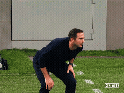 Man Standing On Field With Heitse Text GIF