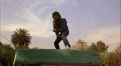 Man Standing On Green Van GIF