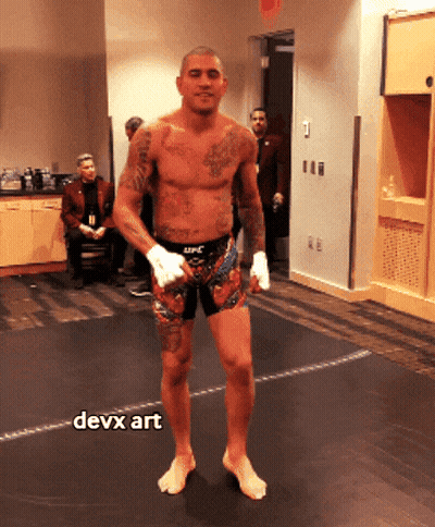 Man Standing On Mat With Devx Art GIF