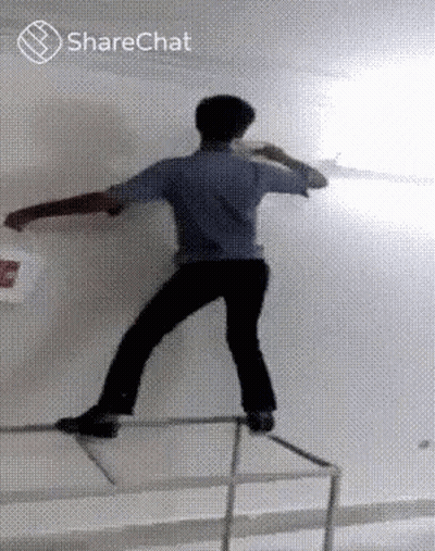 Man Standing On Railing With Bucket GIF
