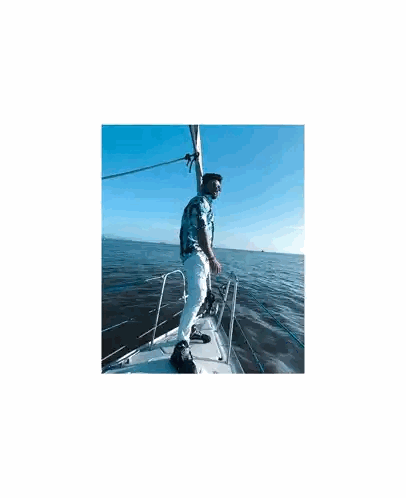 Man Standing On Sailboat Bow Sticker