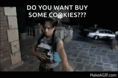 Man Standing On Sidewalk Holding Water And Cookies GIF