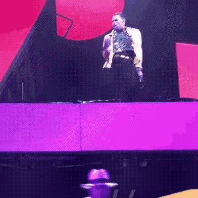 Man Standing On Stage With Microphone GIF