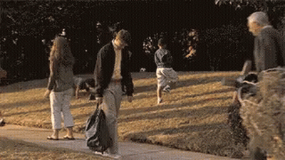 Man Standing On Stairs Looking Down GIF