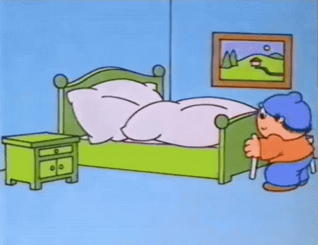 Man Standing On Stool In Front Of Bed GIF