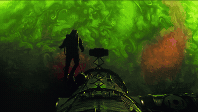 Man Standing On Top Of A Rocket GIF