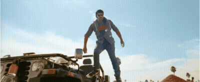 Man Standing On Vehicle Hood GIF